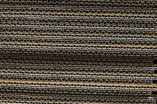 A stack of recycled cardboard that’s been corrugated.